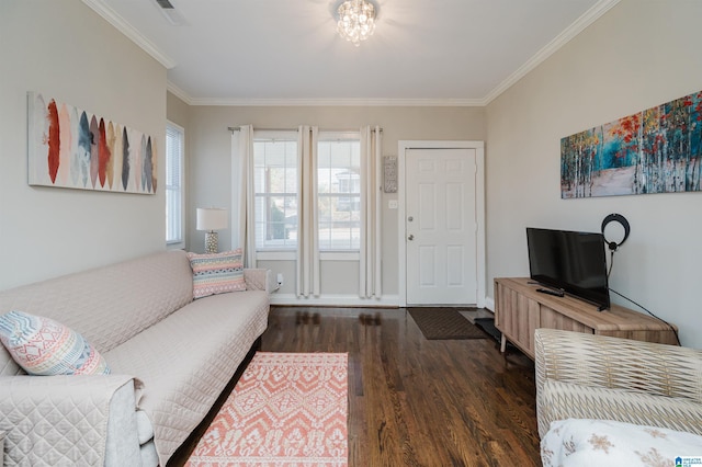 living room featuring dark hardwood / wood-style flooring and ornamental molding