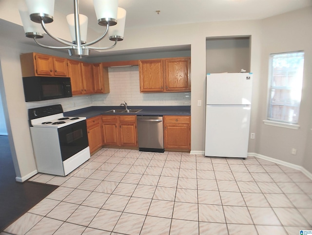 kitchen featuring sink, a notable chandelier, white appliances, decorative backsplash, and light tile patterned floors