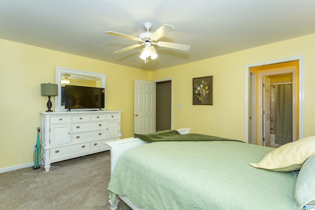 bedroom featuring light colored carpet and ceiling fan