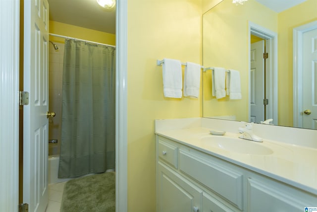 bathroom with tile patterned flooring, vanity, and shower / tub combo with curtain