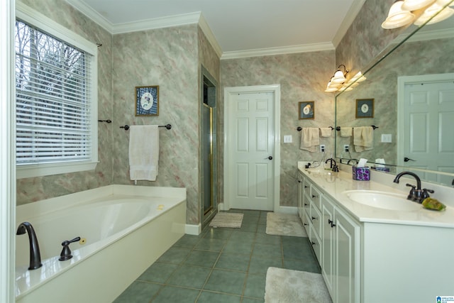 bathroom with tile patterned flooring, vanity, ornamental molding, and a washtub