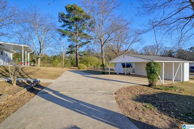 exterior space featuring a carport