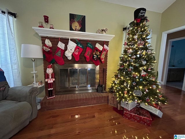 interior details with hardwood / wood-style floors and a fireplace