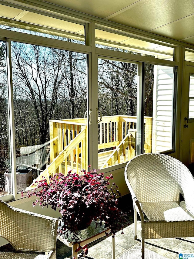 sunroom with plenty of natural light