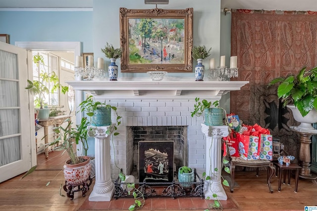 interior details with hardwood / wood-style floors and a fireplace