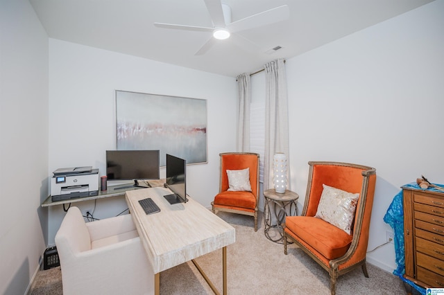 office space with ceiling fan and light colored carpet