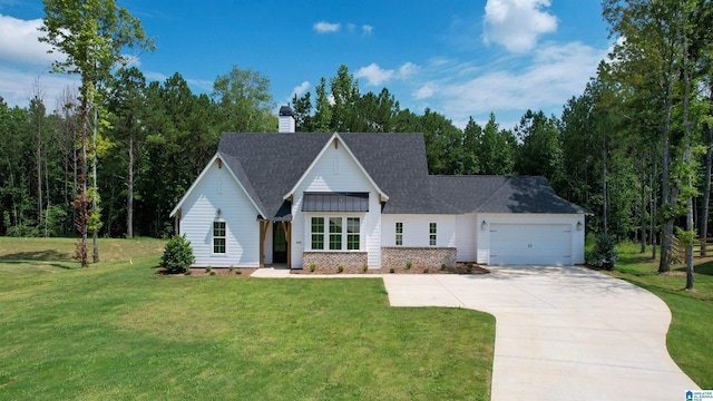 view of front facade featuring a front yard and a garage