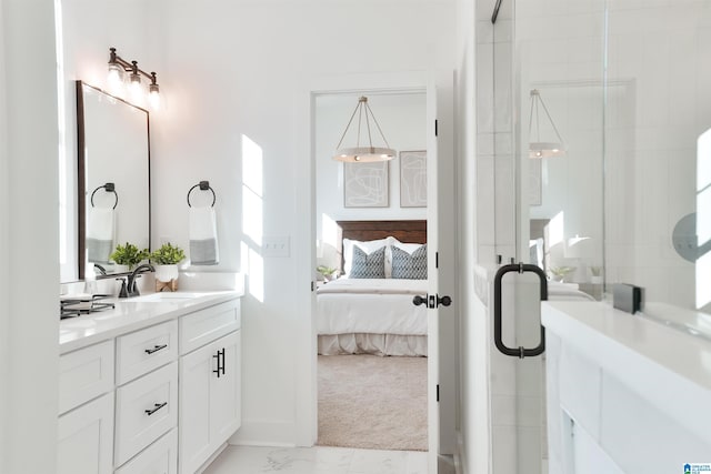 bathroom with vanity and an enclosed shower