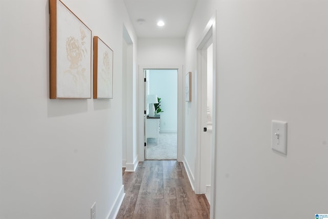 hall with light wood-type flooring