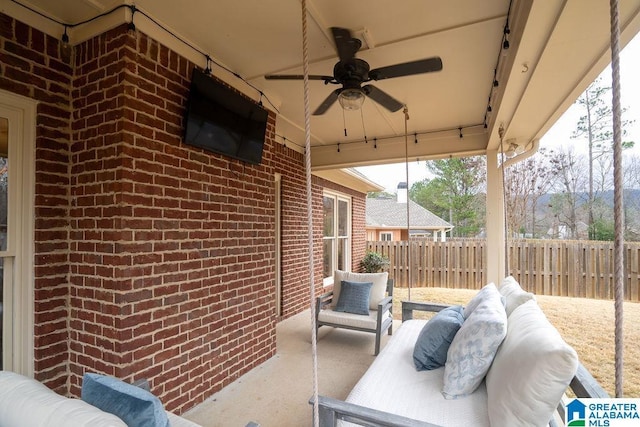 view of patio / terrace featuring ceiling fan and an outdoor hangout area