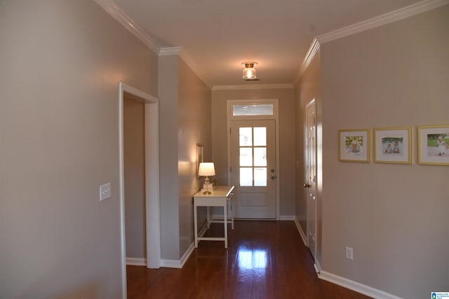 doorway to outside with dark hardwood / wood-style floors and ornamental molding