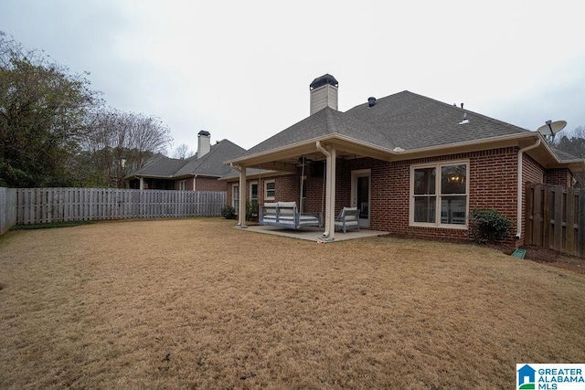 rear view of house featuring a patio area