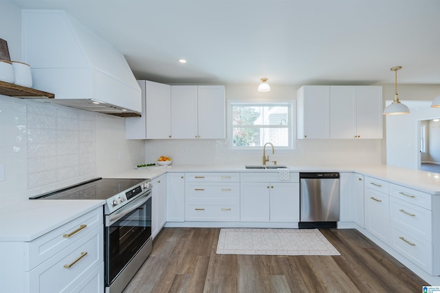 kitchen featuring white cabinetry, sink, and stainless steel appliances