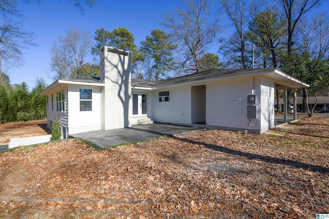 back of property featuring a patio area