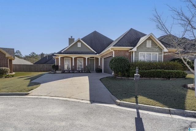 view of front facade featuring covered porch and a front lawn