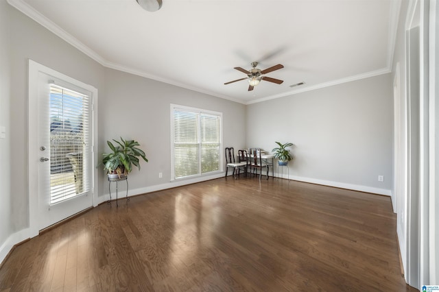 unfurnished room with ceiling fan, dark hardwood / wood-style floors, and ornamental molding