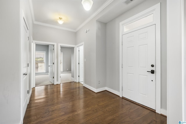 entrance foyer featuring ornamental molding and dark wood-type flooring