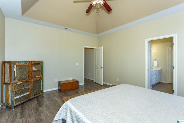 bedroom featuring dark hardwood / wood-style flooring, ensuite bath, and ceiling fan