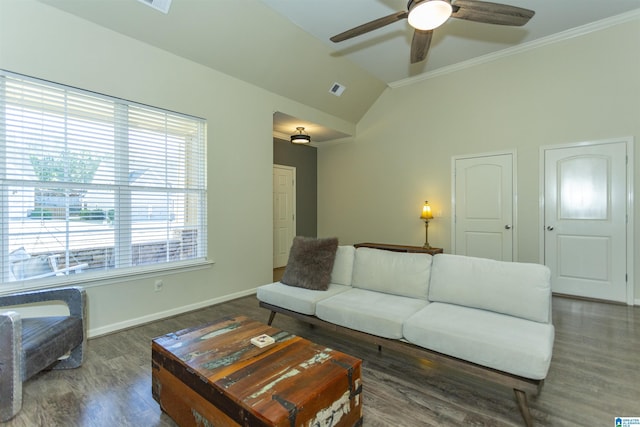 living room with ceiling fan, dark hardwood / wood-style flooring, vaulted ceiling, and ornamental molding