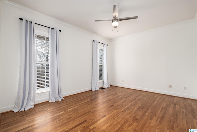 spare room with wood-type flooring, ceiling fan, and ornamental molding