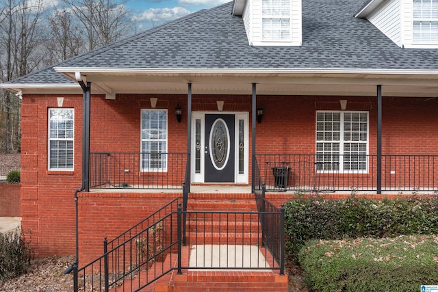 property entrance featuring a porch