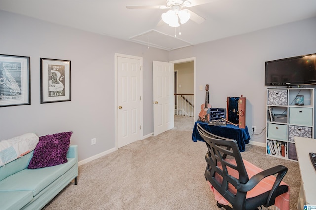 carpeted office with ceiling fan