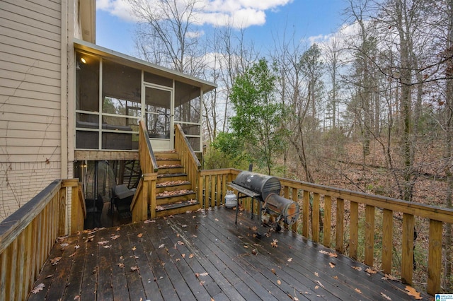 wooden deck with a sunroom