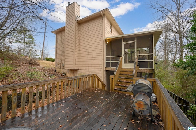 deck with a sunroom