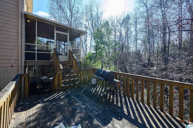 deck featuring a sunroom