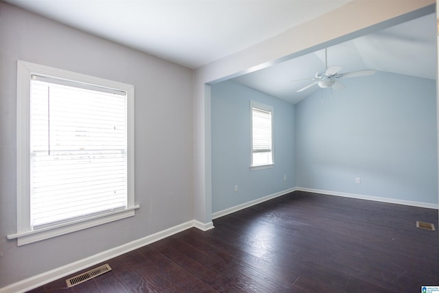 unfurnished room featuring vaulted ceiling, ceiling fan, and dark wood-type flooring