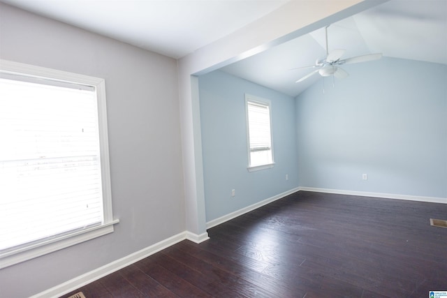 unfurnished room with ceiling fan, dark hardwood / wood-style floors, and lofted ceiling