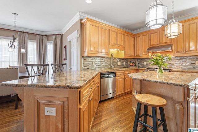 kitchen with dishwasher, pendant lighting, light hardwood / wood-style floors, and ornamental molding