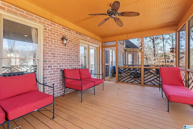 exterior space with ceiling fan