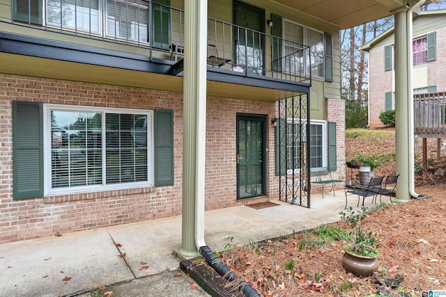 doorway to property featuring a patio