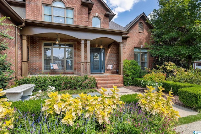 doorway to property featuring covered porch