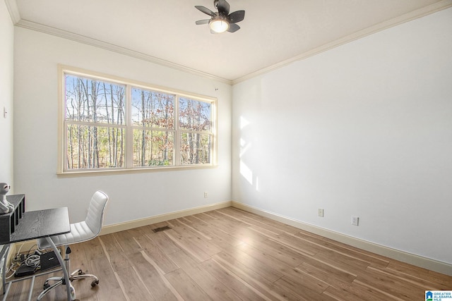 office space with ceiling fan, wood-type flooring, and ornamental molding