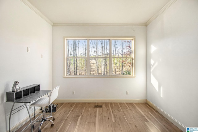 office space featuring hardwood / wood-style flooring and ornamental molding