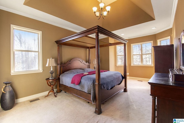 bedroom featuring light carpet, a chandelier, and ornamental molding