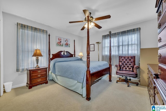 carpeted bedroom with ceiling fan