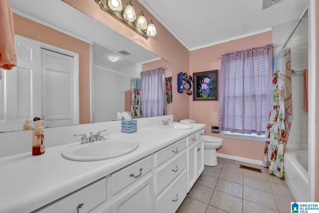 full bathroom with tile patterned flooring, crown molding, toilet, vanity, and shower / tub combo