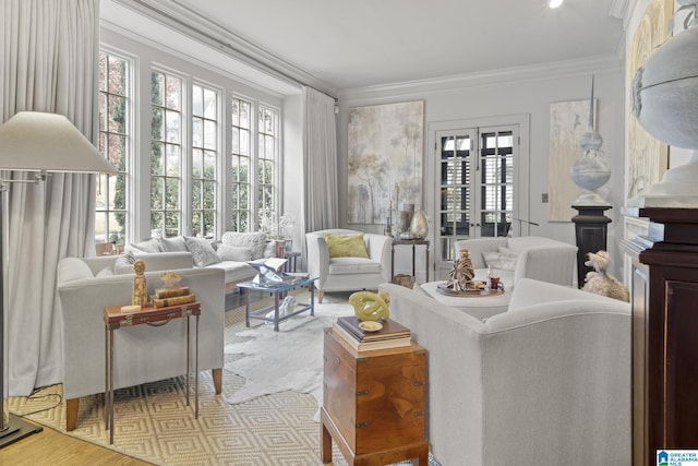 interior space featuring light wood-type flooring and crown molding