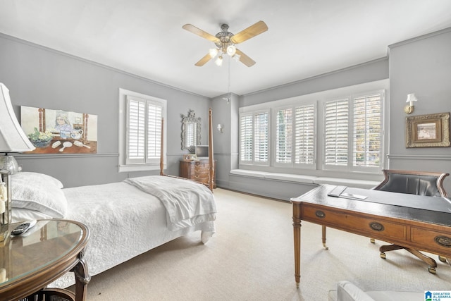 bedroom with ceiling fan and light colored carpet