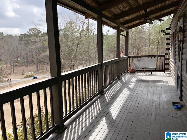 wooden terrace with ceiling fan