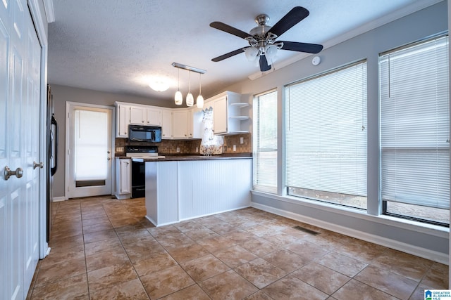 kitchen featuring kitchen peninsula, hanging light fixtures, electric range, a textured ceiling, and white cabinetry