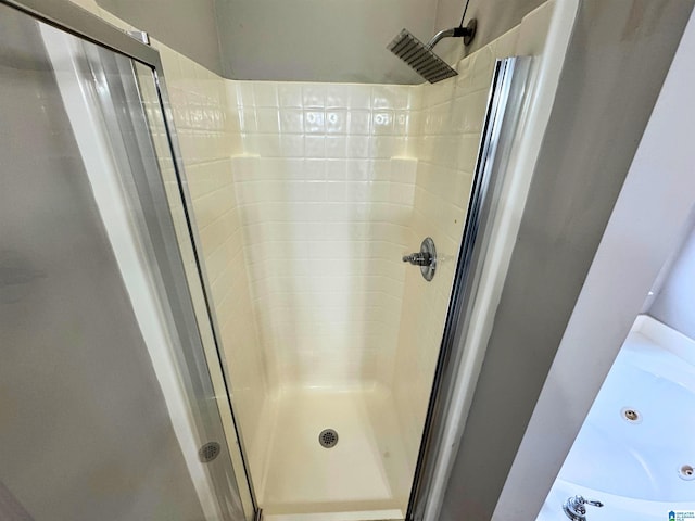 bathroom featuring walk in shower