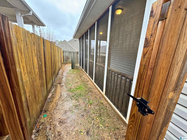 view of yard featuring a sunroom