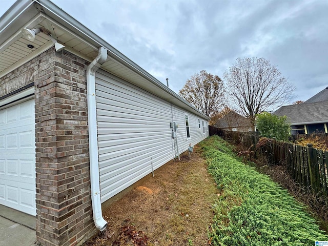 view of property exterior featuring a garage