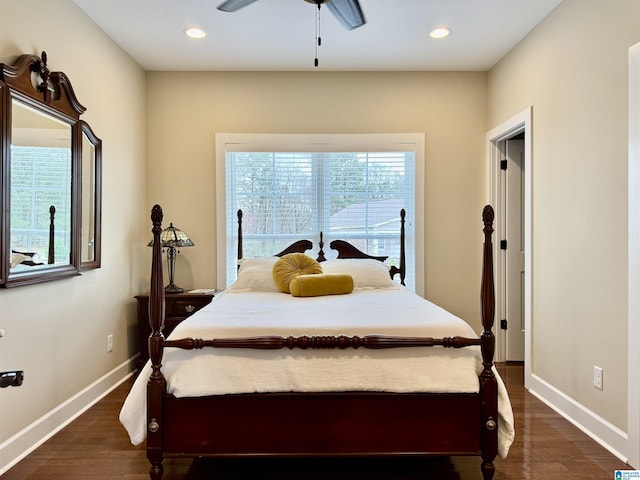 bedroom featuring ceiling fan and dark wood-type flooring