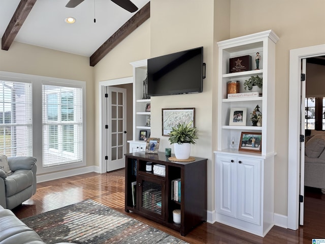 living room featuring dark hardwood / wood-style flooring, lofted ceiling with beams, and ceiling fan