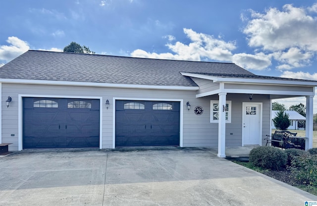 single story home featuring a garage